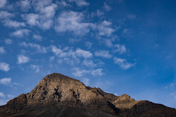 Fototapeta na wymiar Beautiful Rocky Mountain captured early in the morning. Minimal photo of a rocky mountain.
