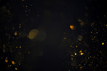 Dreamy golden swirly bokeh lights overlay on dark background