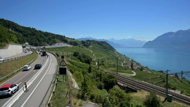 Time lapse over A9 highway through lavaux vineyard and lake Geneva. Puidoux, Vaud Canton, Switzerland. UNESCO world heritage site in summer. Travel destination.