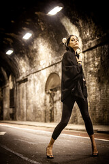 Urban Fashion. A beautiful young mixed race girl on location in a confident pose. From a series of...
