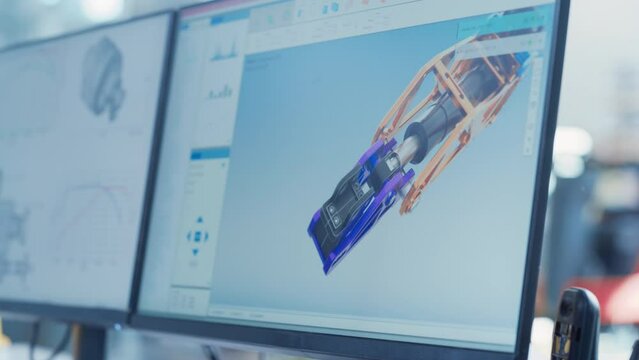 Close Up of a Computer Monitor Display with 3D CAD Software Interface with Digital Hydraulic Heavy Industry Object Being Designed. Modern Factory Engineer's Office Concept.