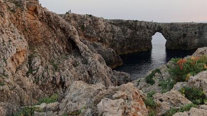 Pont d'en Gil at sunset. Famous Pont d'en Gil at the west coast of Menorca (Minorca), Balearic Islands, Spain.
