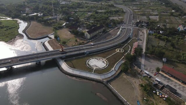 Aerial view, the new bridge of Kretek 2. The bridge that has the Keris icon. The southern causeway of Yogyakarta (JLLS) passes through the Depok lagoon.