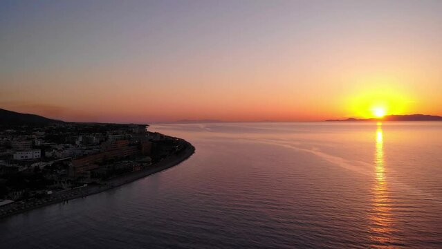 Scenic Sunset Over Rhodes Island With Ialysos Beach Resort In Greece. Aerial Shot