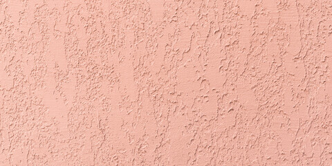 Coral stucco wall texture, peach color background. Abstract grunge artistic backdrop for design. Salmon color ribbed paper, pastel orange plaster, pattern.