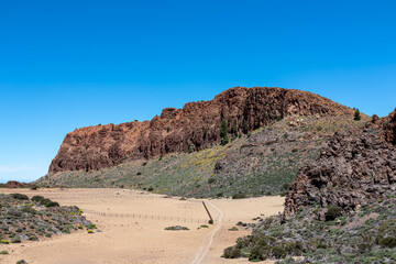 Panoramic view on Riscos de la Fortaleza near Pico del Teide, Mount El Teide National Park, Tenerife, Canary Islands, Spain, Europe. Hiking trail from El Portillo via La Canada de los Guancheros plain