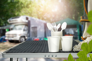 Touristic table at a campsite with a vacant space on a beautiful hot summer holiday day