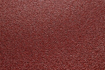 sandpaper red color close up background texture