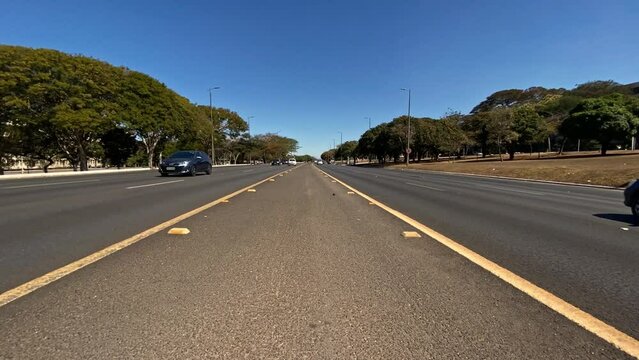 Traffic on a four-lane road in Brasilia, Brazil - time lapse