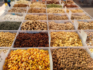 Selling dried fruit and nuts at a street market