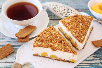 Fototapeta na wymiar Ricotta (cottage cheese) grated tart from cookies and tea