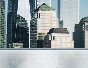 Fototapeta premium Empty concrete rooftop on the background of a beautiful New York city skyline at daytime, mockup