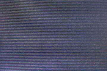 The texture of jeans for the background. View from above. Seamless fabric with jeans texture.