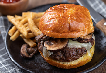 Mushroom cheeseburger on a toasted bun