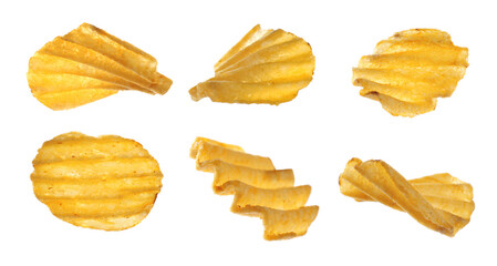 Naklejka premium Set of ridged crispy potato chips on white background