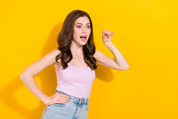 Photo of young girl arm fingers mock bla blah look empty space isolated on yellow color background