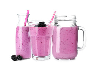 Set of delicious blackberry smoothies on white background