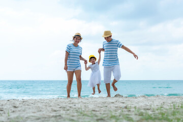 Naklejka premium Happy family summer sea beach vacation. Asia young&nbsp;people lifestyle travel enjoy fun and relax leisure destination in holiday. Travel and Family Concept