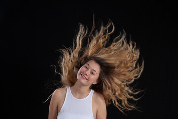 Pretty blond slinging her hair
