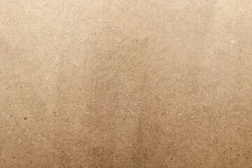 Fototapeta na wymiar Texture of kraft eco paper, from recycling. Close up of a cardboard surface.