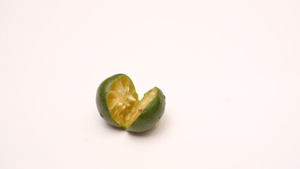 Halved lime isolated on white background