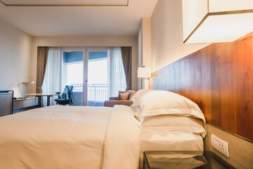 Comfort bedroom with white mattress in luxury hotel style.