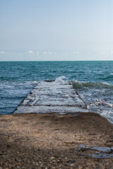 Fototapeta premium photography of waves and breakwater on the sea