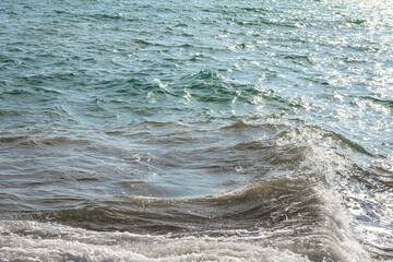 photography of the waves and ripples of the black sea
