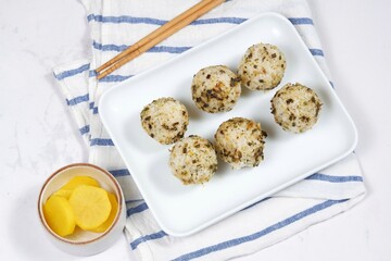  Jumeogbab  (주먹밥)-Korean rice ball . A famous traditional Korean food, rice mixed with vegetable and seaweed.