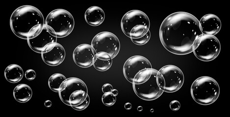 Realistic soap bubbles on black backgraund