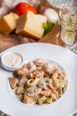 Pasta with meat, champignon, cheese