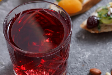 Summer drinks and toasts with fruits on a gray table. Healthy food, dietary snack, vegetarian snacks.