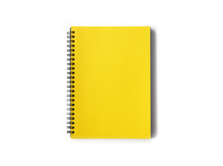 Spiral coil notebook with yellow cover isolated on white with plenty of space around it for creative use.