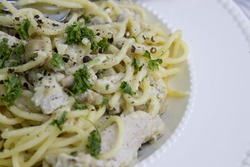 Spaghetti With Truffle Cream Sauce on White Background