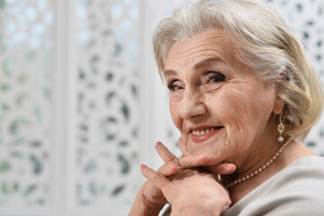 Portrait of a cute smiling elderly woman