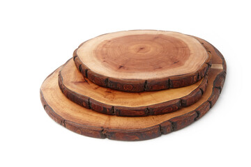 Wooden stand for a dish on a white background. A saw cut of a tree trunk to demonstrate the presentation of the product