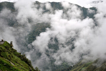 The mist covered terrain turns green during monsoon look mesmerizing at Tsomgo Lake area situated...