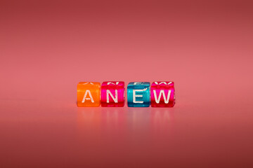 the word "anew" made up of cubes