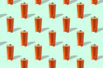Tomato juice in glass with greens isolated on light green background. Seamless pattern.