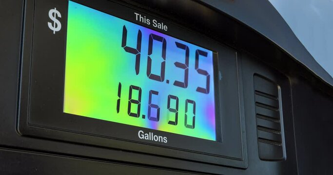 Digits counter of petrol pump by gasoline station with high rising gas prices
