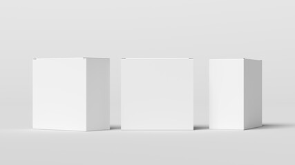 Three square boxes mock up. White gift boxes on white background. Front view.