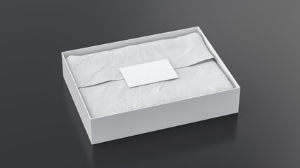 Gift box mock up. White gift box with blank label or business card on wrapping paper. Black background. Side view.