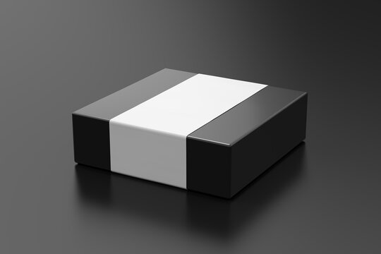 Square box mock up with blank paper cover label: Black gift box on black background. Side view.