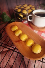 Nastar is a kind of pastry made from flour, butter, and egg dough filled with pineapple or chocolate jam, and other flavors. The origin of the word comes from the Dutch ananas and taart. The shape of 