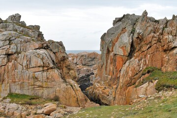 Fototapeta na wymiar The rocky coastline at Plougrescant in Brittany-France