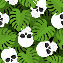 Skull and monstera pattern seamless. skeleton head and tropical leaves background