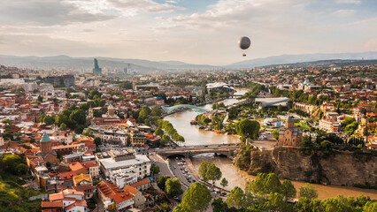 The urban landscape of Tbilisi in the daytime. Bird's-eye view - obrazy, fototapety, plakaty