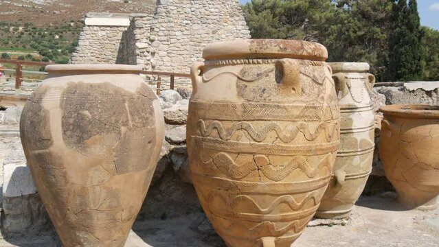 Ancient amphoras on the territory famous Knossos Palace of King Minos where, Theseus killed the Minotaur. The ruins of the famous architectural monument of the Bronze Age, the Minoan civilization