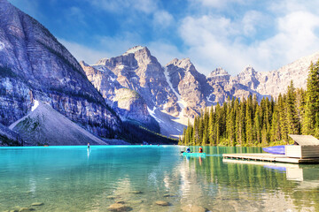 Summer morning boating on Moraine Lake in the Canadian Rocky Mountains