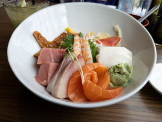 A bowl of slices of raw sashimi fish make a delicious bowl of Chirashi sushi